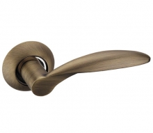 Коллекция Absolut - Дверная ручка ADDEN BAU SWELL A110 на круглой розетке Bronze бронза