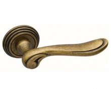 Коллекция Vintage - Дверная ручка ADDEN BAU ISOLA V209 на круглой розетке AGED BRONZE состаренная бронза